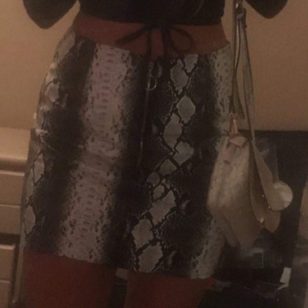 Snake print leather skirt